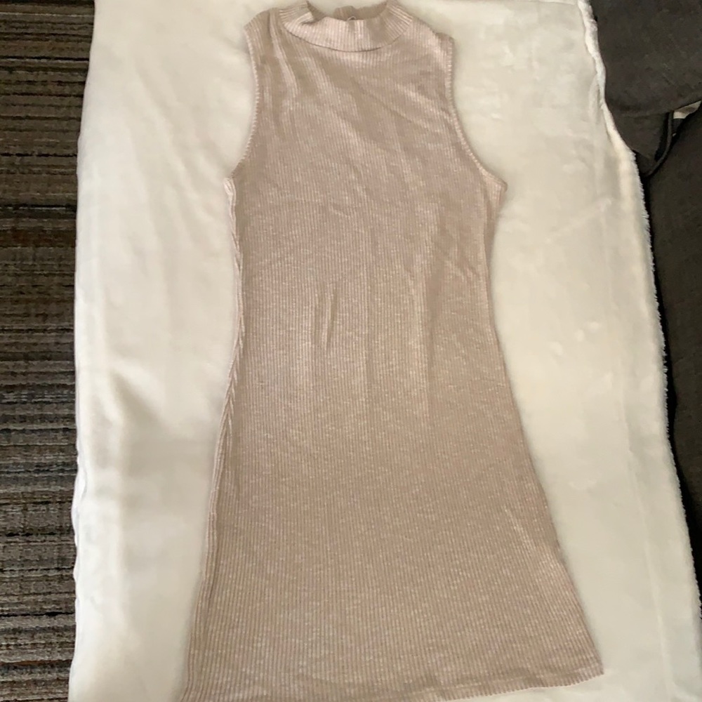 Knit turtle neck dress.